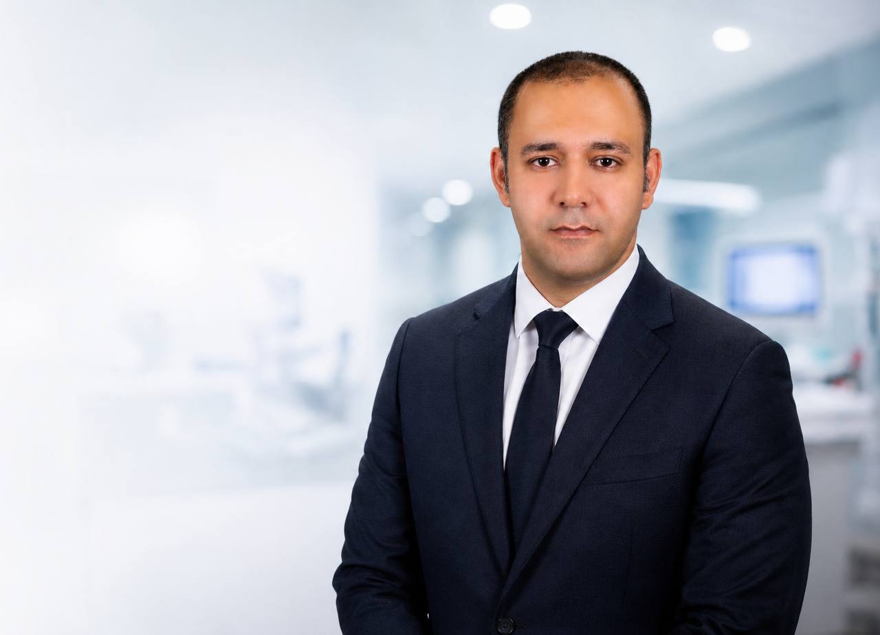 Dr. Behzad Shahi in a suit